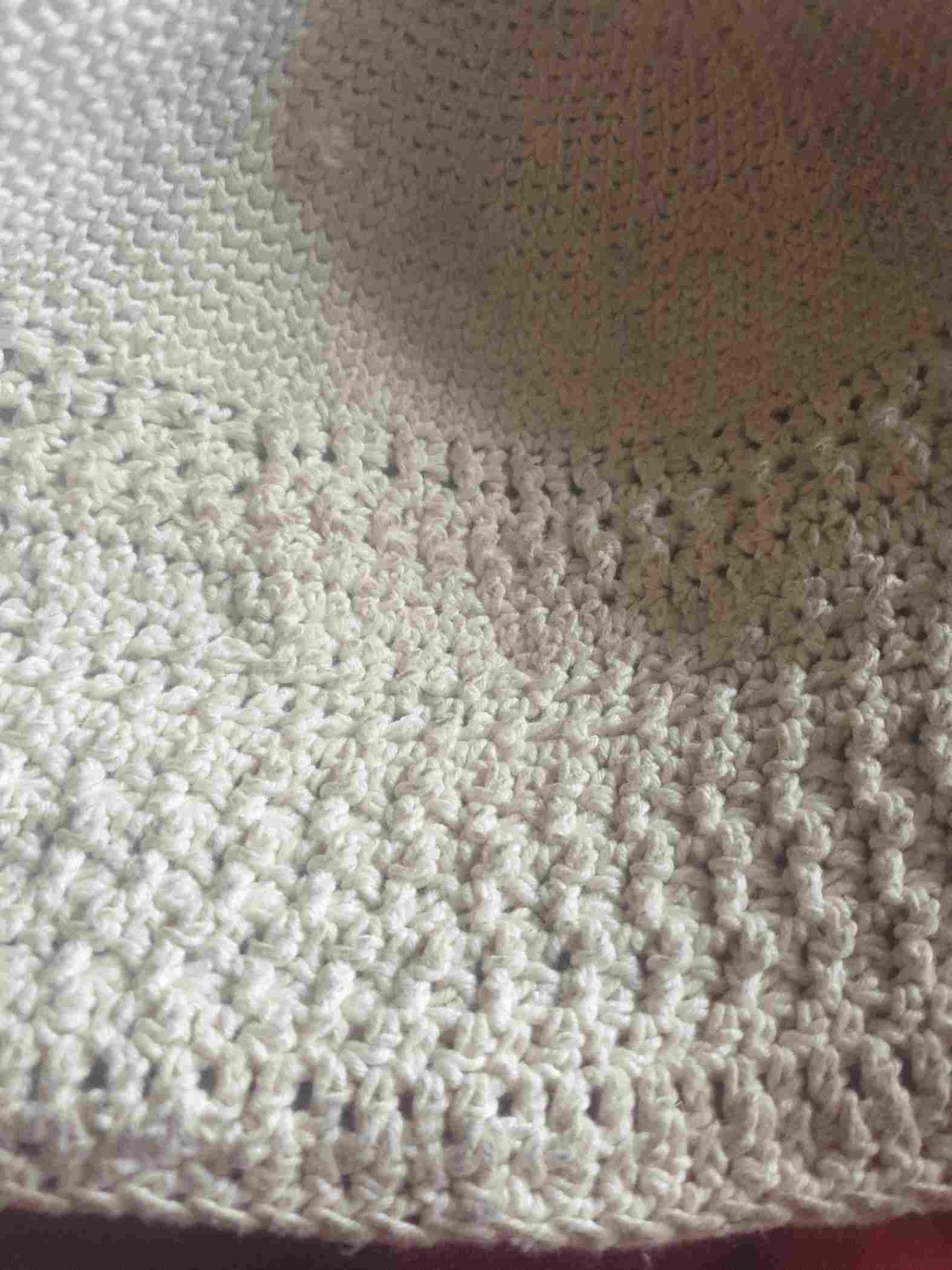 Crochet patterns on cotton.
For a hat